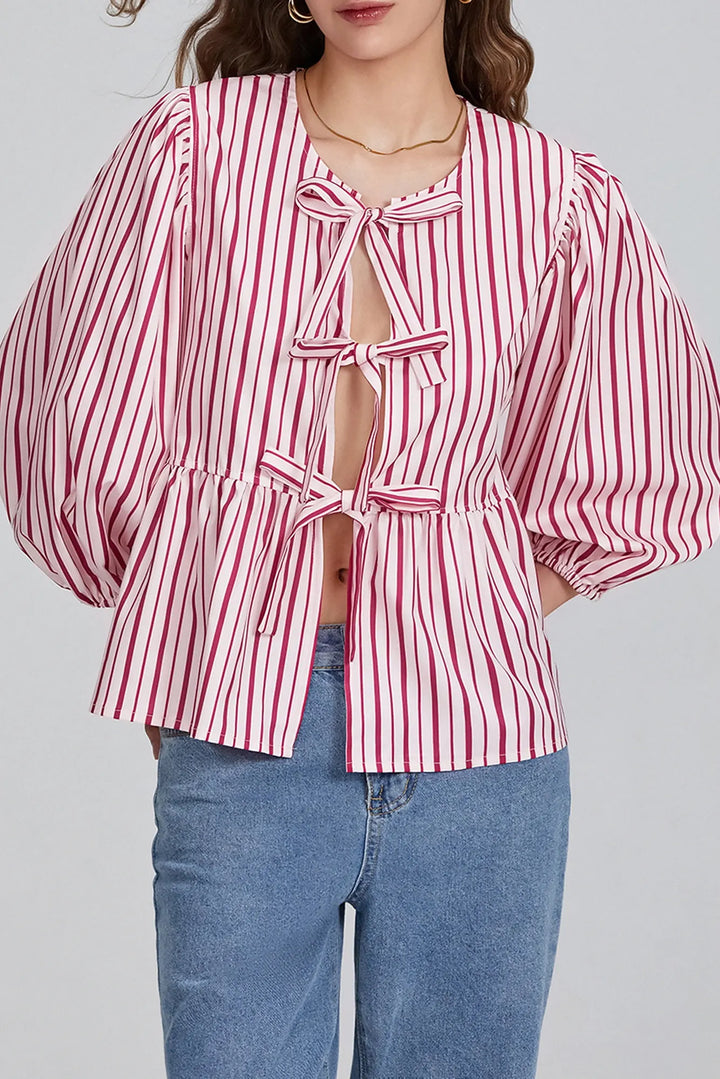 Sofia™ | Blusa con maniche a sbuffo, peplum e fiocchetti