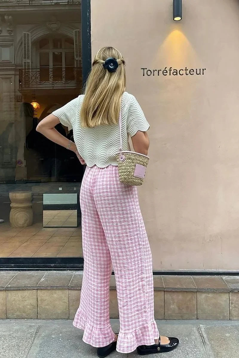 Sofia™ | Blusa con colletto Peter Pan e fiocchi