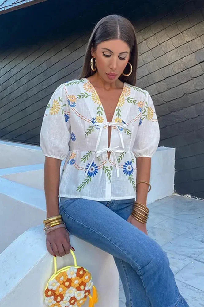 Sofia™ | Blusa Peplum con Motivo Floreale e Fiocco