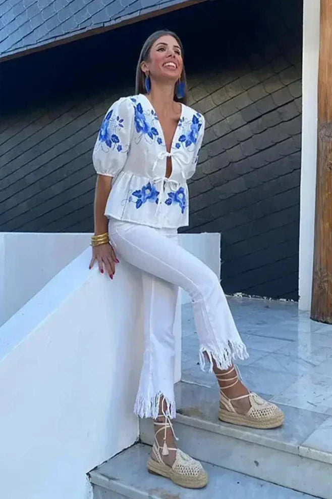 Sofia™ | Blusa Peplum con Motivo Floreale e Fiocco